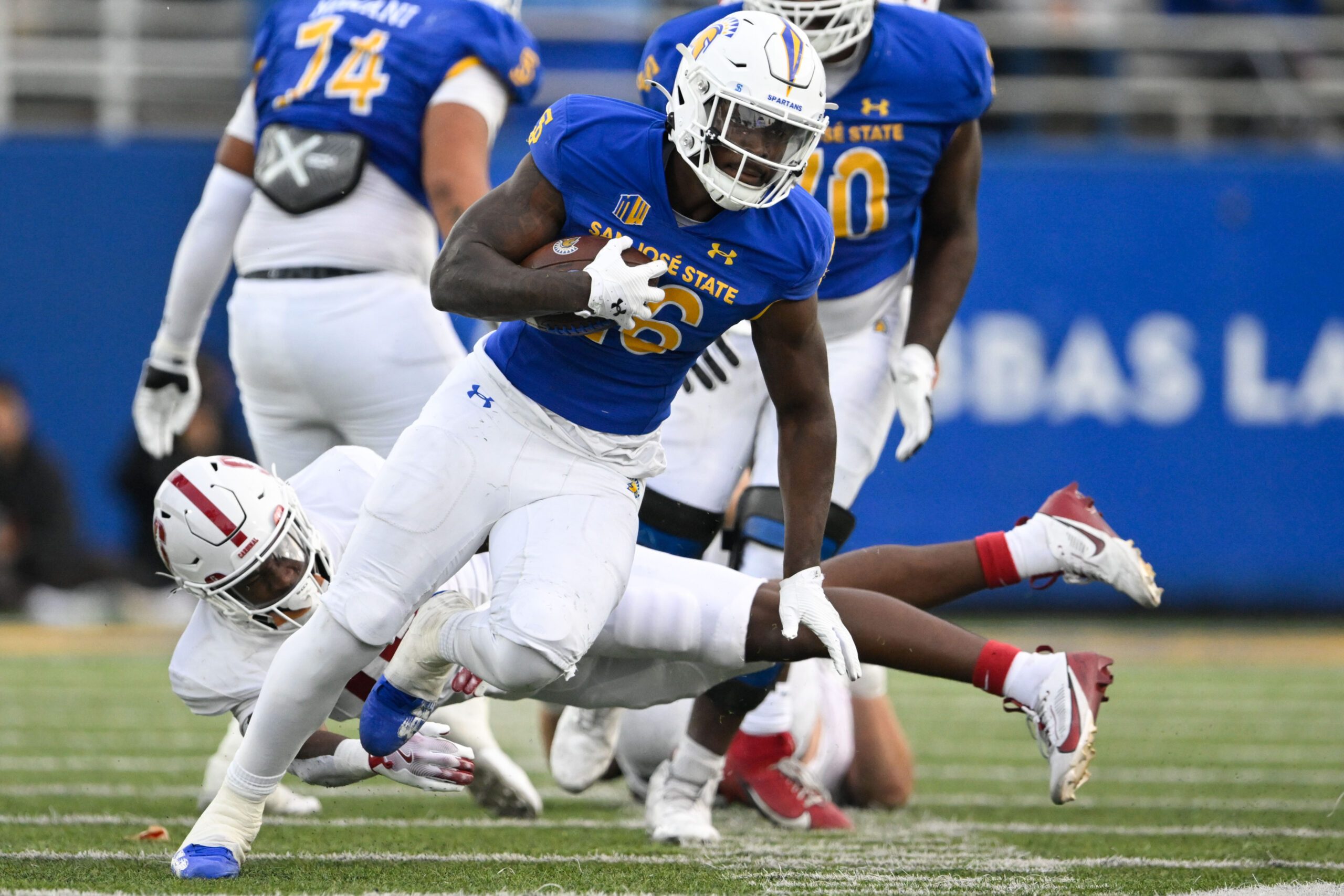 Nov 29, 2024; San Jose, California, USA; San Jose State Spartans running back Lamar Radcliffe (26) runs the ball against the Stanford Cardinal in the fourth quarter at CEFCU Stadium. Mandatory Credit: Eakin Howard-Imagn Images