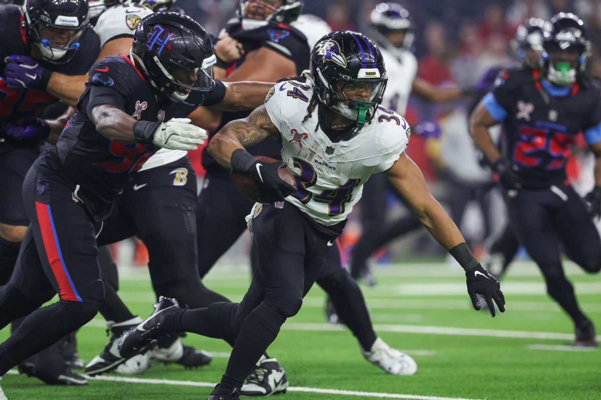 Dec 25, 2024; Houston, Texas, USA; Baltimore Ravens running back Keaton Mitchell (34) runs with the ball during the fourth quarter against the Houston Texans at NRG Stadium. Mandatory Credit: Troy Taormina-Imagn Images