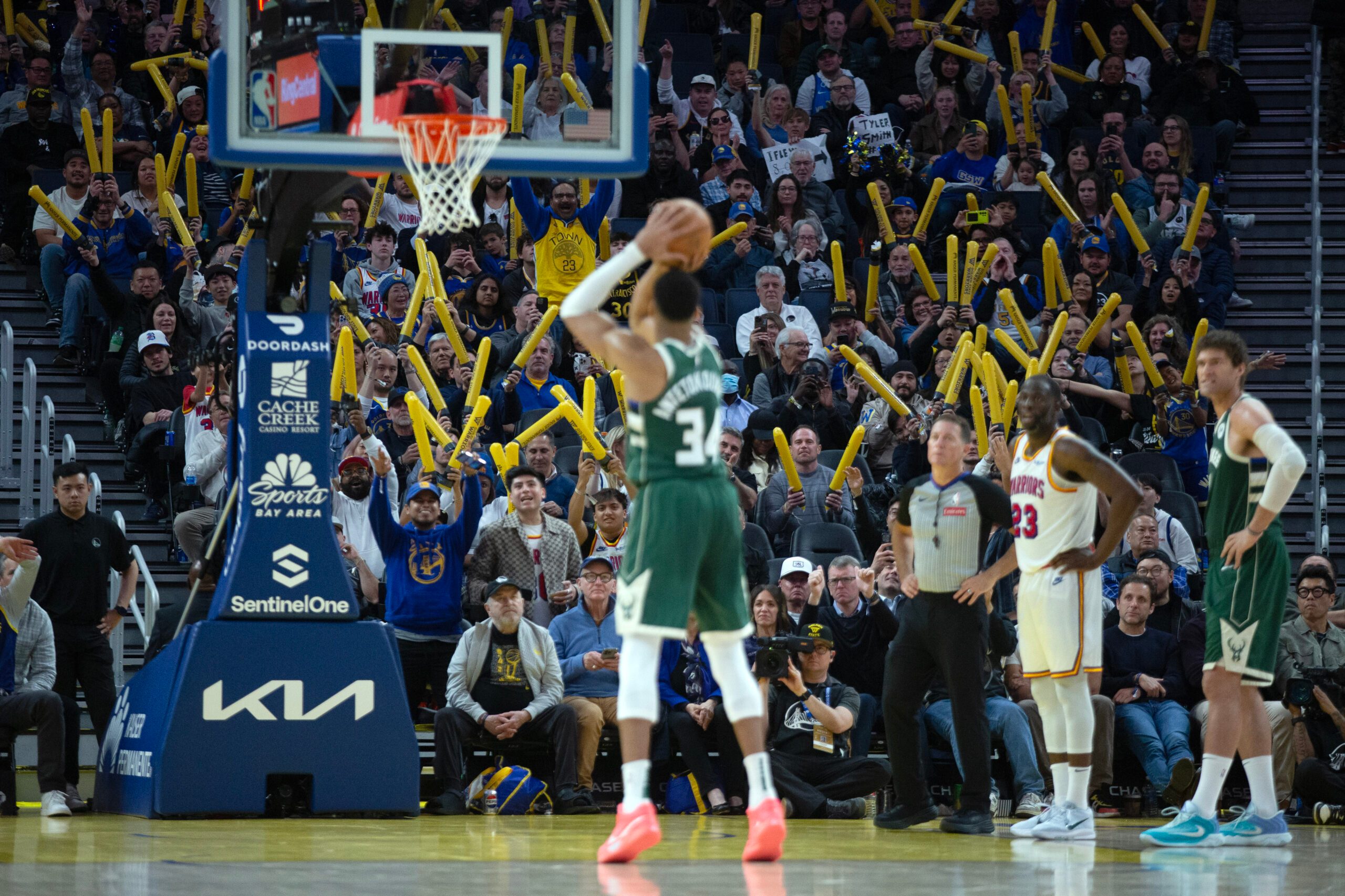 Mar 18, 2025; San Francisco, California, USA; Golden State Warriors fans attempt to distract Milwaukee Bucks forward Giannis Antetokounmpo (34) as he shoots a free throw during the fourth quarter at Chase Center. Mandatory Credit: D. Ross Cameron-Imagn Images