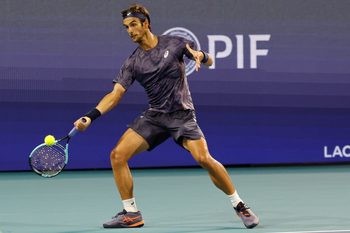 Mar 25, 2025; Miami, FL, USA; Lorenzo Musetti (ITA) hits a forehand against Novak Djokovic (SRB)(not pictured) on day eight of the Miami Open at Hard Rock Stadium. Mandatory Credit: Geoff Burke-Imagn Images