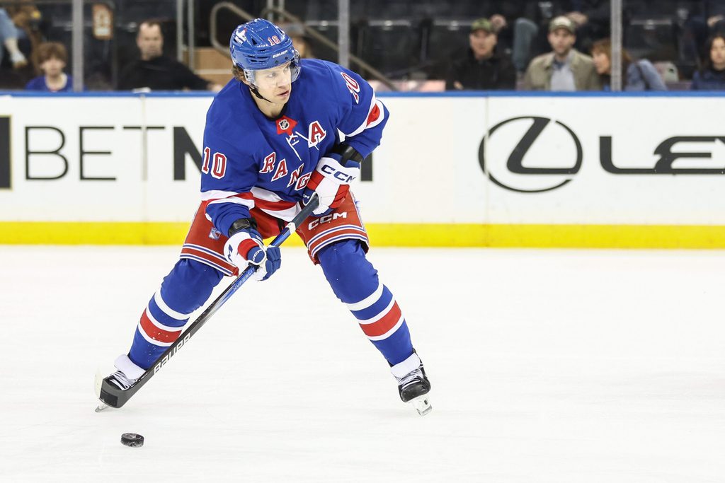 Apr 17, 2025; New York, New York, USA; New York Rangers left wing Artemi Panarin (10) attempts a shot on goal in the third period against the Tampa Bay Lightning at Madison Square Garden. Mandatory Credit: Wendell Cruz-Imagn Images