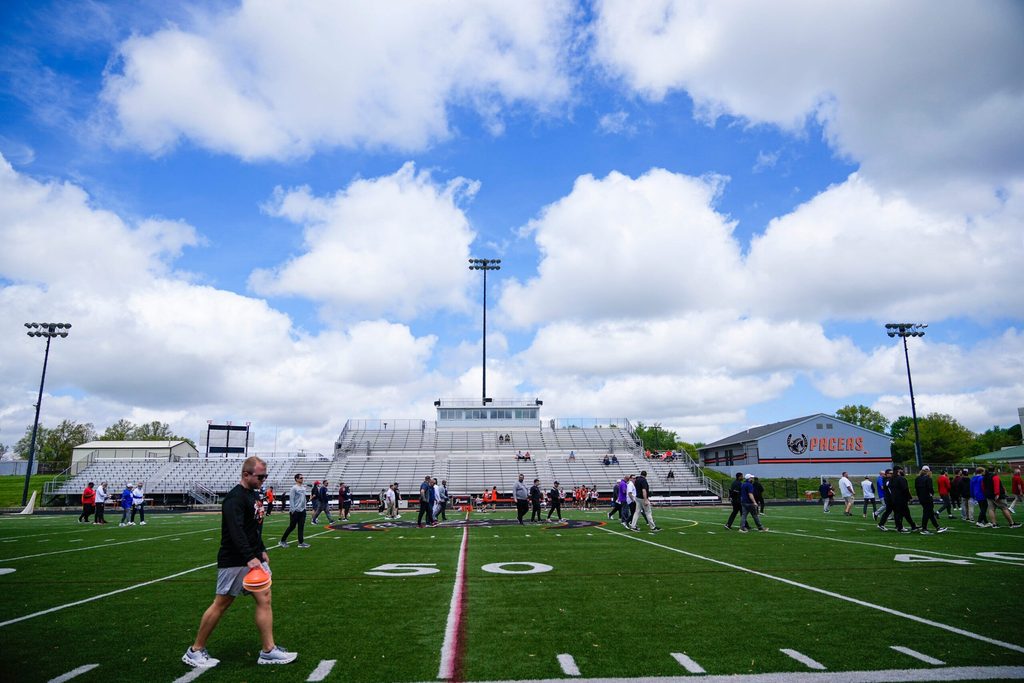 Delaware Hayes football players participate in drills during the college football showcase at the Delaware Hayes High School on Wednesday, May 7, 2025 in Delaware, Ohio.