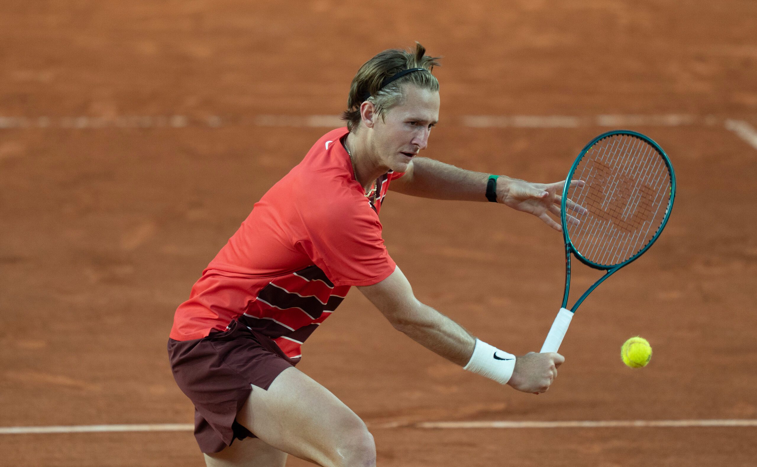 May 30, 2025; Paris, FR; Sebastian Korda of the United States returns a shot during his match against Frances Tiafoe of the United States on day six at Roland Garros Stadium.  Mandatory Credit: Susan Mullane-Imagn Images