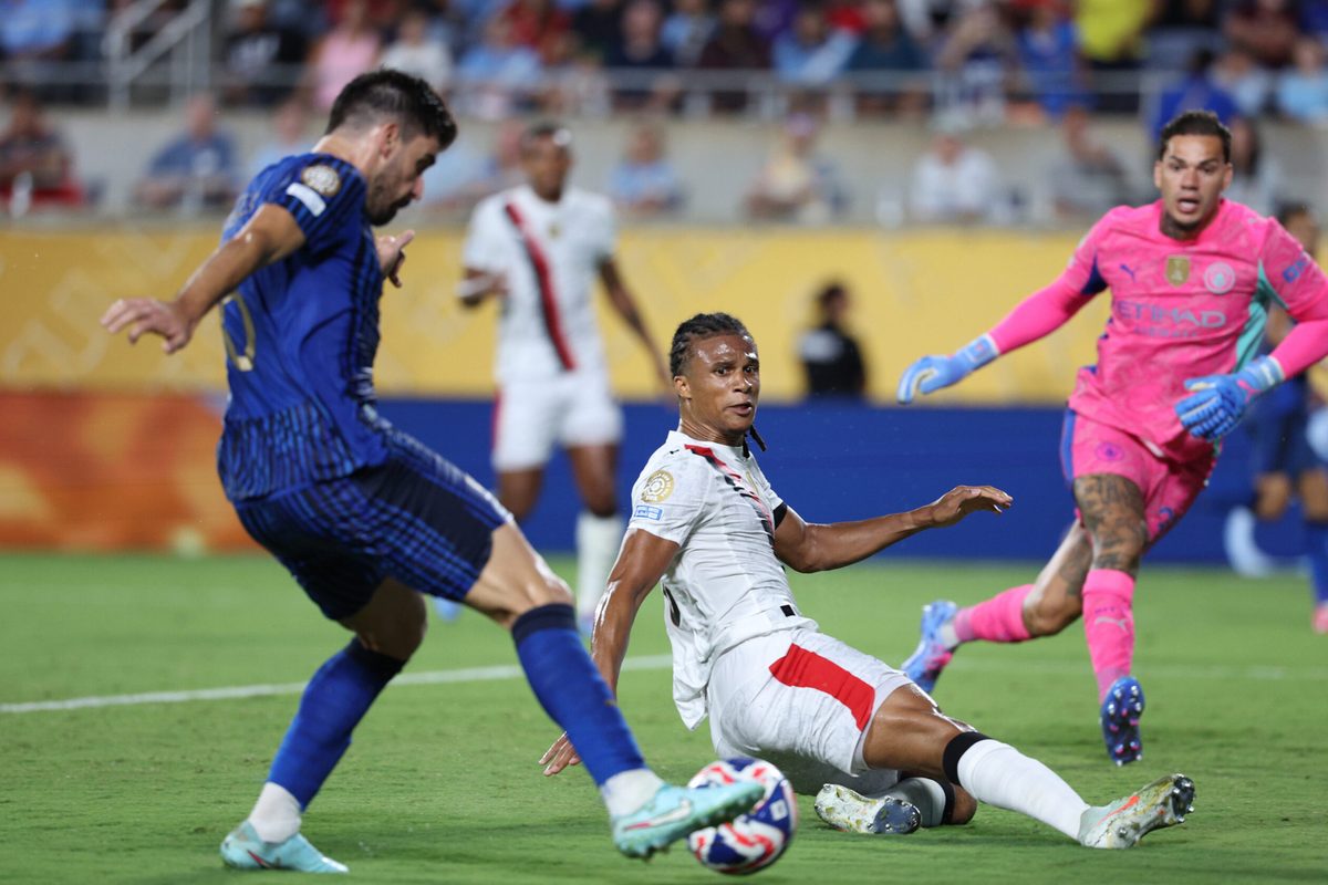 Jun 30, 2025; Orlando, Florida, USA; Manchester City defender Nathan Ake (6) blocks a shot by Al Hilal FC midfielder Ruben Neves (8) in extra time during a round of 16 match of the 2025 FIFA Club World Cup at Camping World Stadium. Mandatory Credit: Nathan Ray Seebeck-Imagn Images
