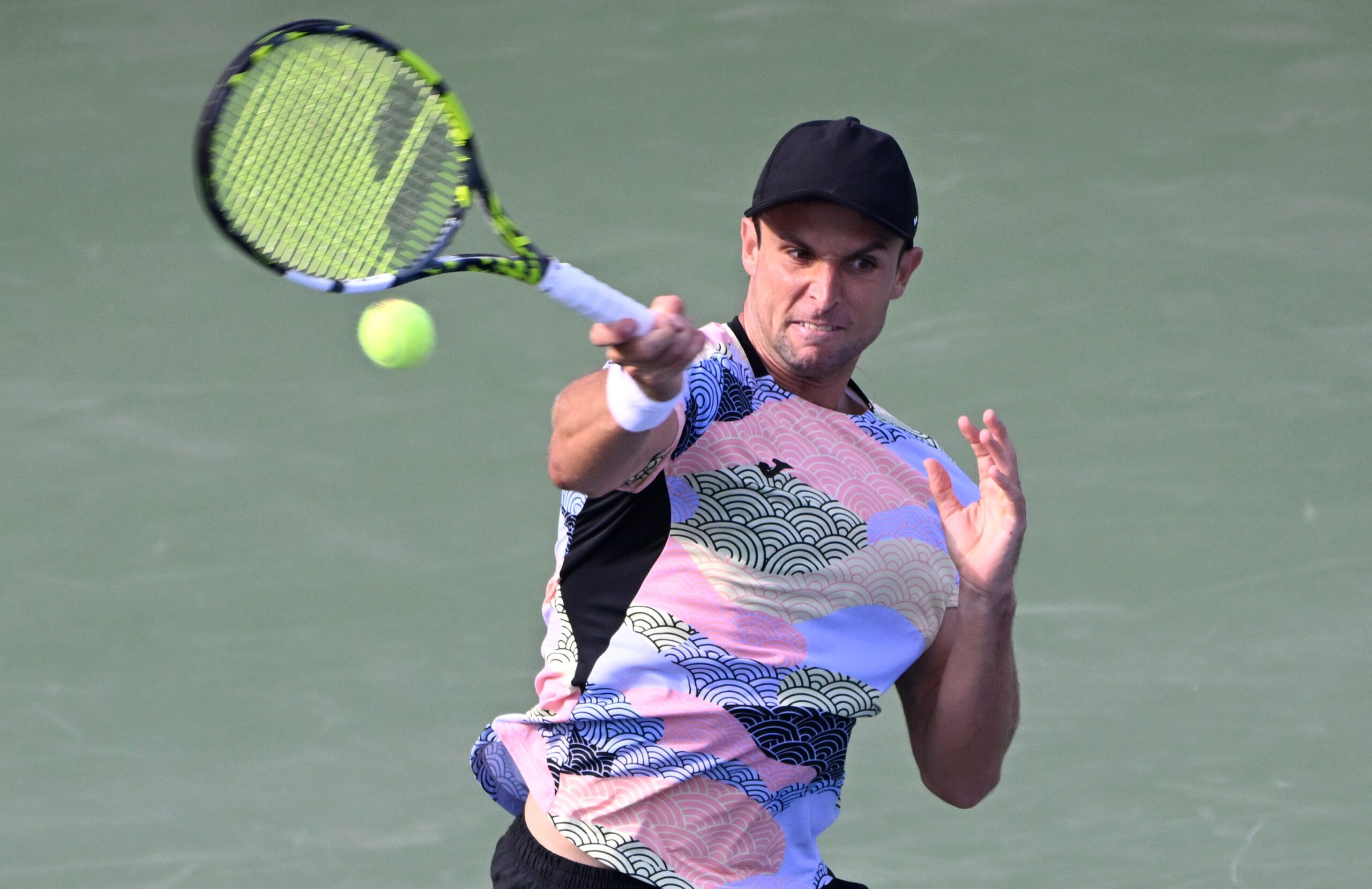 Aug 1, 2025; Toronto, ON, Canada; Aleksandar Vukic (AUS)  plays a shot against Frances Tiafoe (USA) during third round play at Sobeys Stadium. Mandatory Credit: Dan Hamilton-Imagn Images