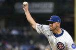 Aug 19, 2025; Chicago, Illinois, USA;  Chicago Cubs pitcher Jameson Taillon (50) delivers during the first inning against the Milwaukee Brewers at Wrigley Field. Mandatory Credit: Matt Marton-Imagn Images