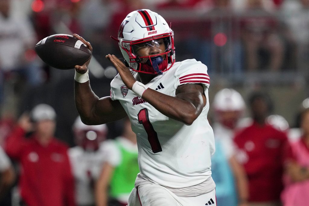 Aug 28, 2025; Madison, Wisconsin, USA; Miami (OH) RedHawks quarterback Dequan Finn (1) throws a pass during the third quarter against the Wisconsin Badgers at Camp Randall Stadium. Mandatory Credit: Jeff Hanisch-Imagn Images