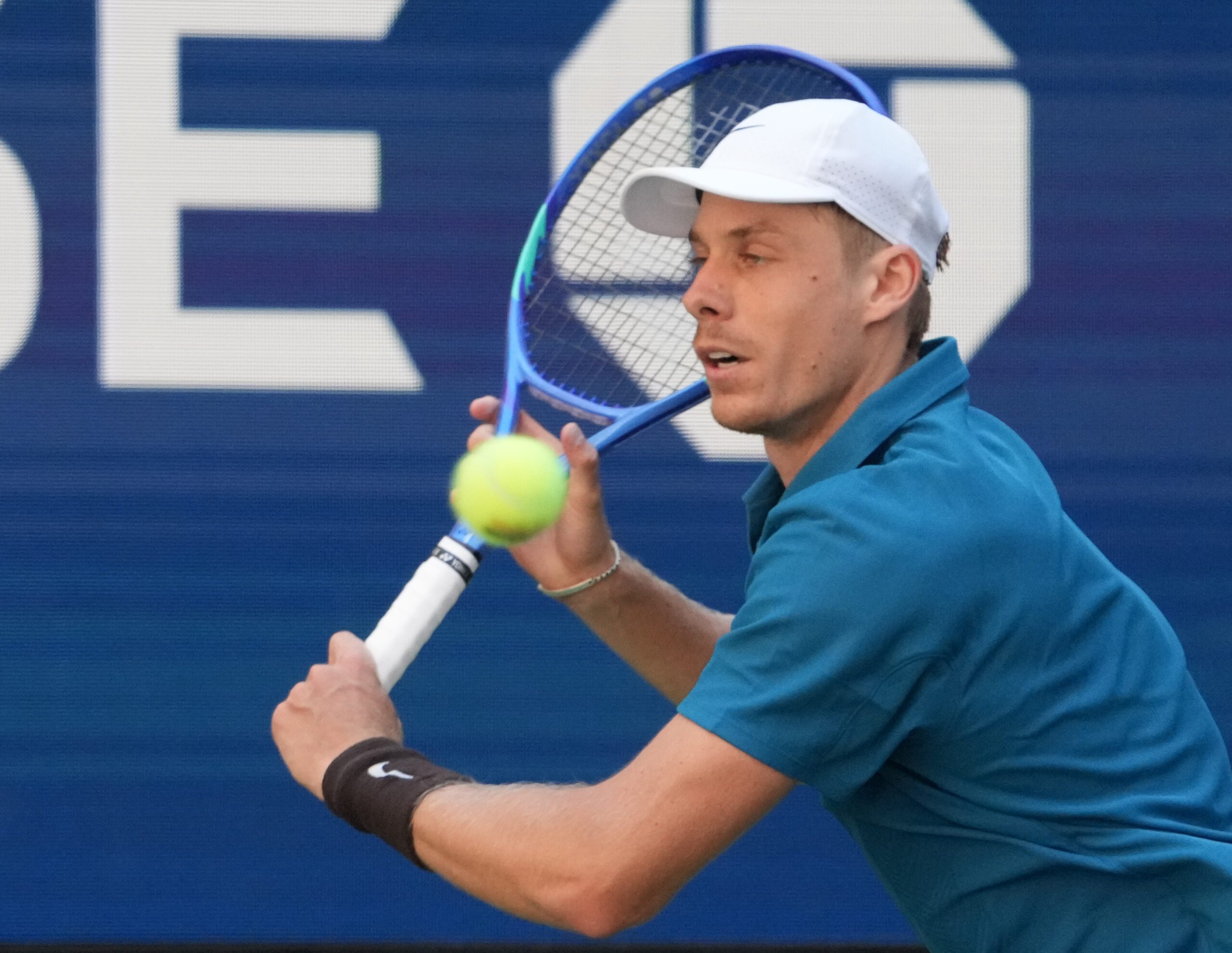 Aug 30, 2025; Flushing, NY, USA;
Denis Shapovalov (CAN) hits to Jannik Sinner (ITA) (not pictured) on day seven of the 2025 U.S. Open tennis tournament at the USTA Billie Jean King National Tennis Center. Mandatory Credit: Robert Deutsch-Imagn Images