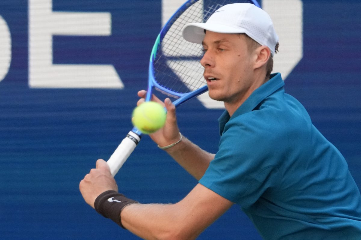 Aug 30, 2025; Flushing, NY, USA;
Denis Shapovalov (CAN) hits to Jannik Sinner (ITA) (not pictured) on day seven of the 2025 U.S. Open tennis tournament at the USTA Billie Jean King National Tennis Center. Mandatory Credit: Robert Deutsch-Imagn Images