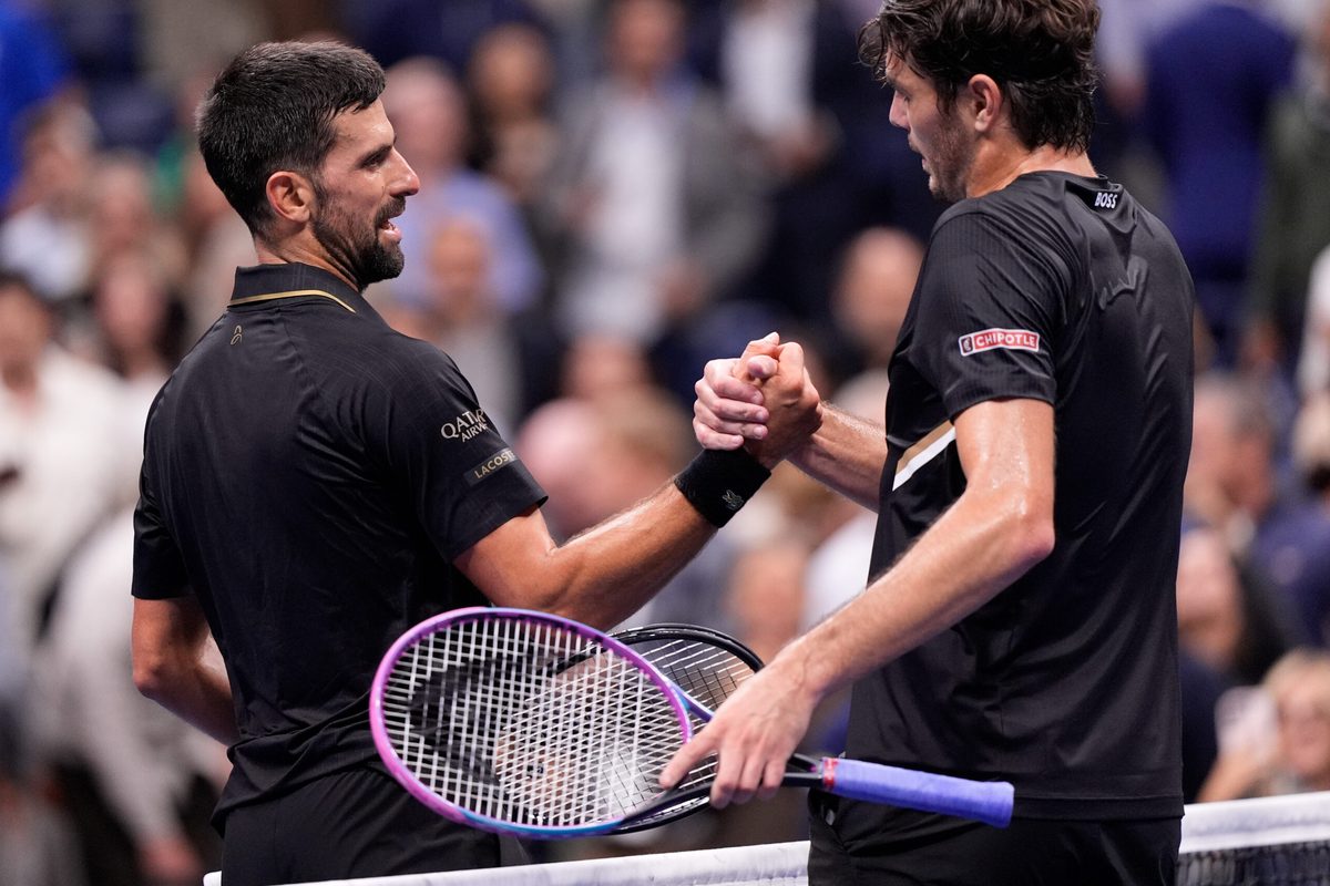 Sep 2, 2025; Flushing, NY, USA;
Novak Djokovic (SRB) (left) after defeating Taylor Fritz (USA) (right) on day ten of the 2025 U.S. Open tennis tournament at the USTA Billie Jean King National Tennis Center. Mandatory Credit: Robert Deutsch-Imagn Images