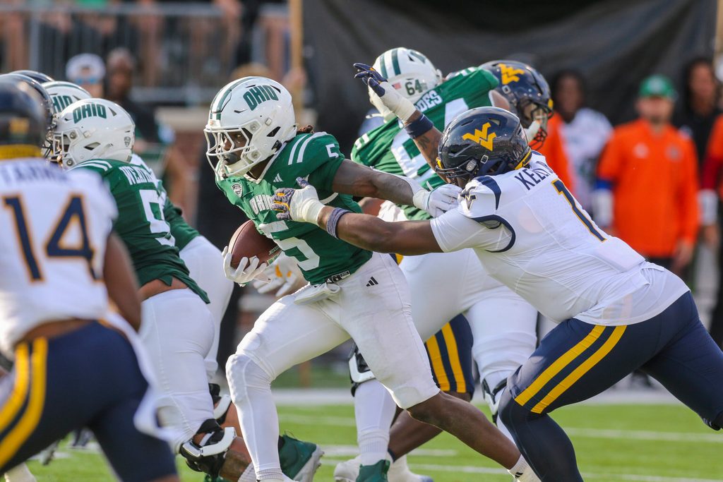 Sep 6, 2025; Athens, Ohio, USA; Ohio Bobcats running back Sieh Bangura (5) runs the ball during the third quarter against the West Virginia Mountaineers at Peden Stadium. Mandatory Credit: Ben Queen-Imagn Images