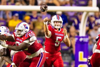 Sep 6, 2025; Baton Rouge, Louisiana, USA;  Louisiana Tech Bulldogs quarterback Blake Baker (5) passes against LSU Tigers during the second half  at Tiger Stadium. Mandatory Credit: Stephen Lew-Imagn Images