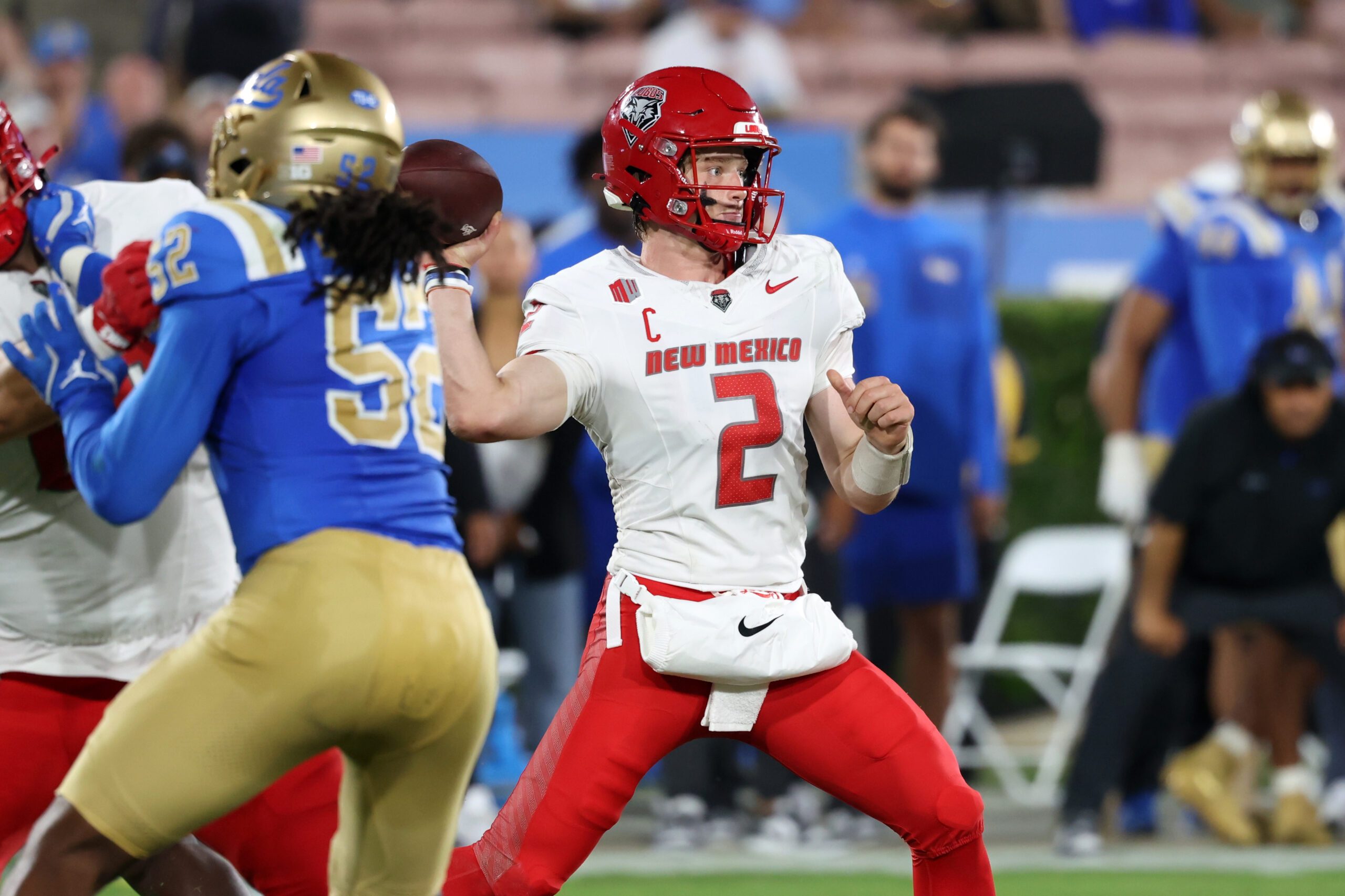 Sep 12, 2025; Pasadena, California, USA;  New Mexico Lobos quarterback Jack Layne (2) throws a pass during the second quarter against the UCLA Bruins at Rose Bowl. Mandatory Credit: Kiyoshi Mio-Imagn Images