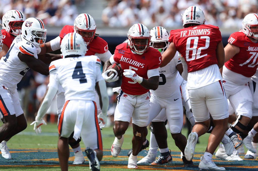 Sep 13, 2025; Auburn, Alabama, USA;  South Alabama Jaguars running back Kentrel Bullock (5) carries during the first quarter against the Auburn Tigers at Jordan-Hare Stadium. Mandatory Credit: John Reed-Imagn Images