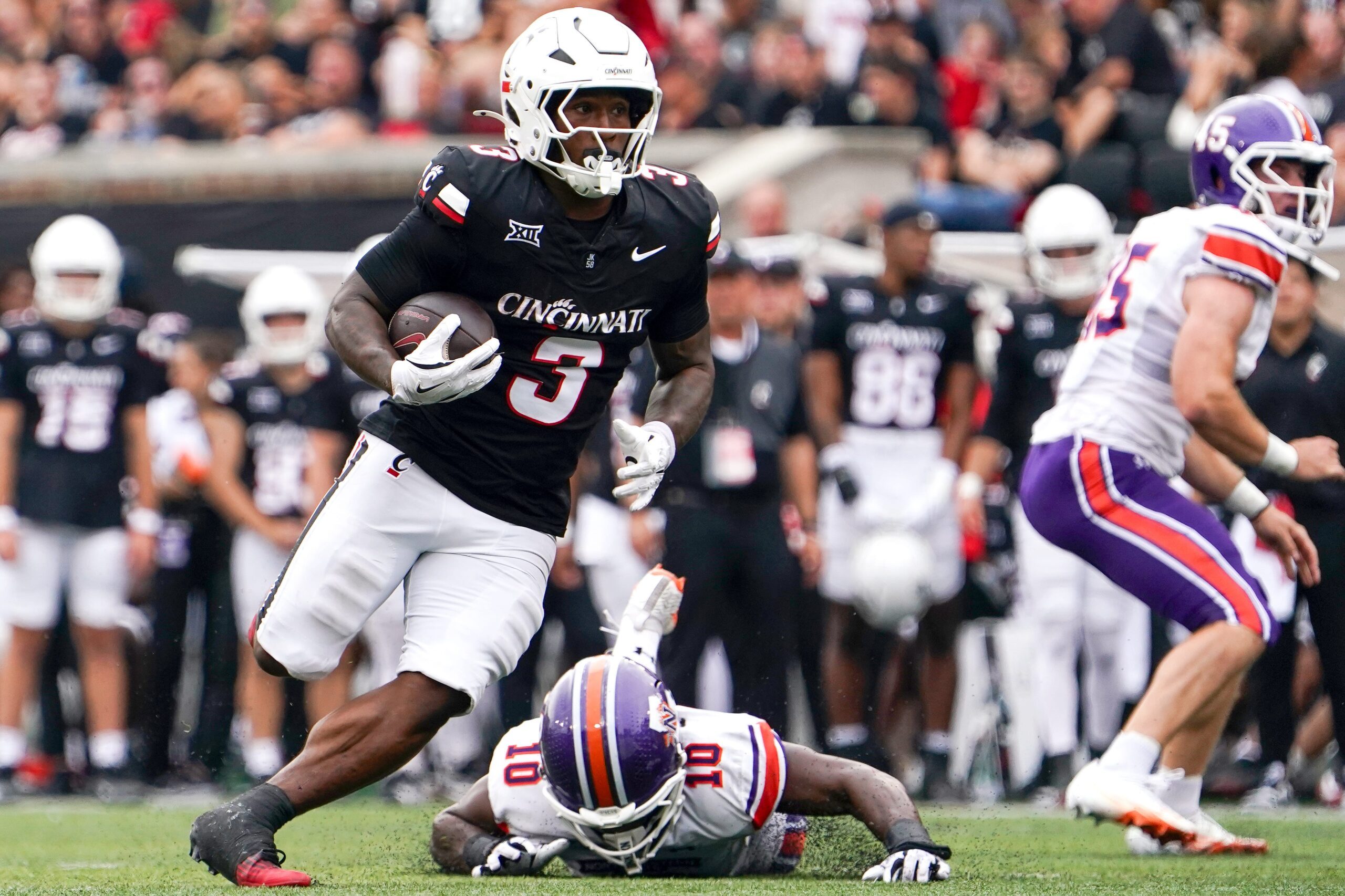 Cincinnati Bearcats running back Tawee Walker (3) runs the ball in the second quarter of a NCAA men’s college football game between the Cincinnati Bearcats and Northwestern State Demons, Saturday, Sept. 13, 2025, at Nippert Stadium in Cincinnati.
