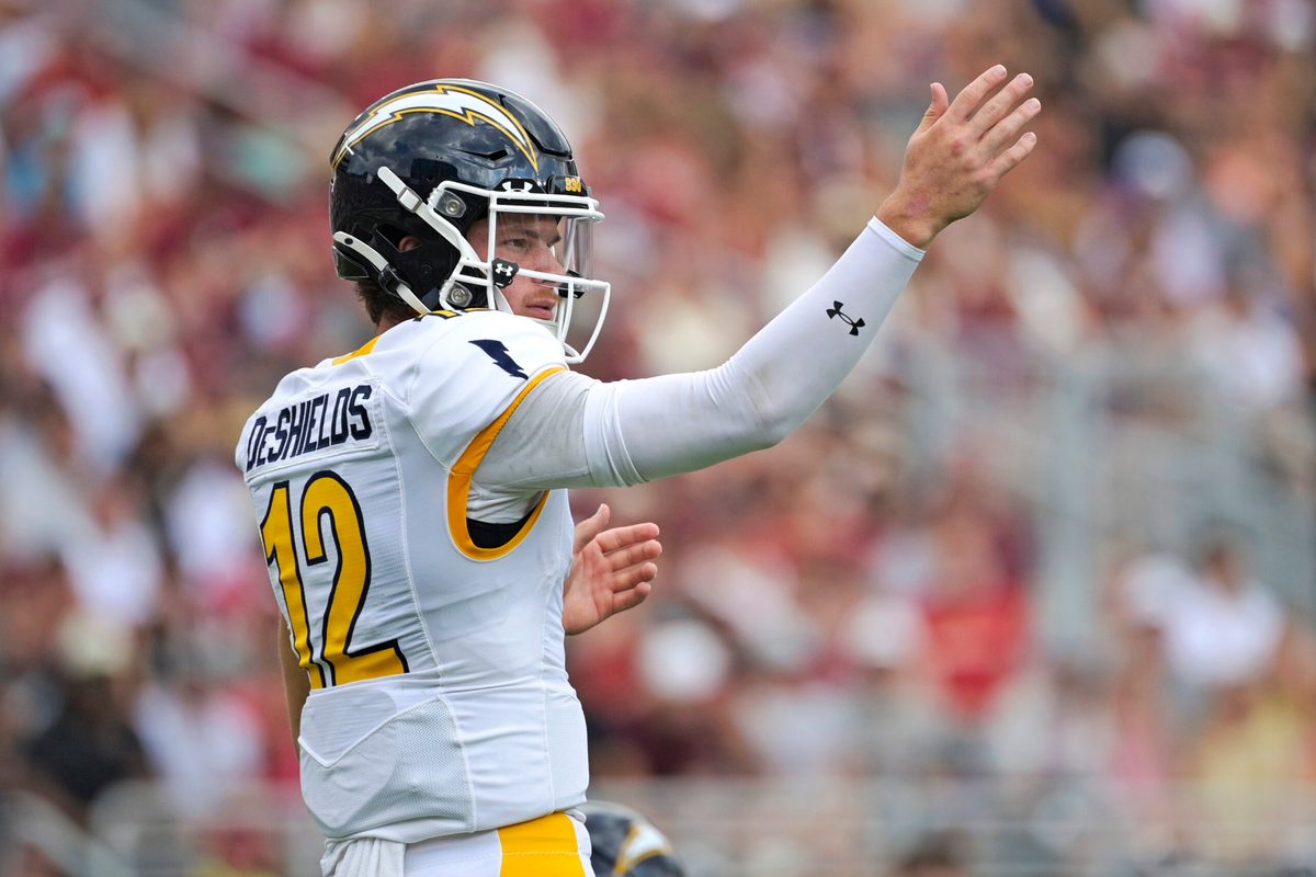 Sep 20, 2025; Tallahassee, Florida, USA; Kent State Golden Flashes quarterback Dru DeShields (12) directs players at the line during the first half against the Florida State Seminoles at Doak S. Campbell Stadium. Mandatory Credit: Melina Myers-Imagn Images