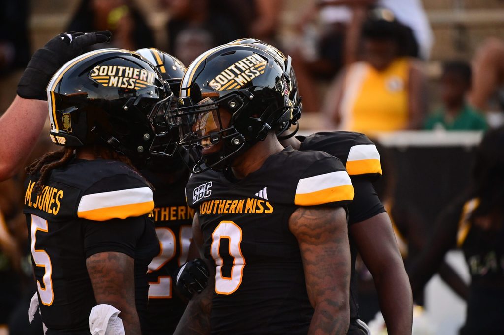 Southern Miss Golden Eagles running back Matt Jones (5) and running back Jeffery Pittman (0) react after a touchdown against the Jacksonville State Gamecocks during the first quarter at M.M. Roberts Stadium in Hattiesburg, Miss. on Sept. 27, 2025.