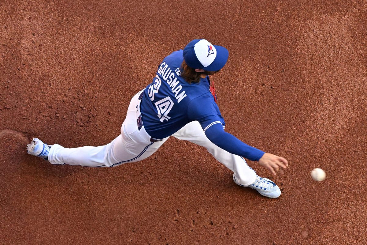 Sep 28, 2025; Toronto, Ontario, CAN; Toronto Blue Jays starting pitcher Kevin Gausman (34) warms up before playing the Tampa Bay Rays at Rogers Centre. Mandatory Credit: Dan Hamilton-Imagn Images