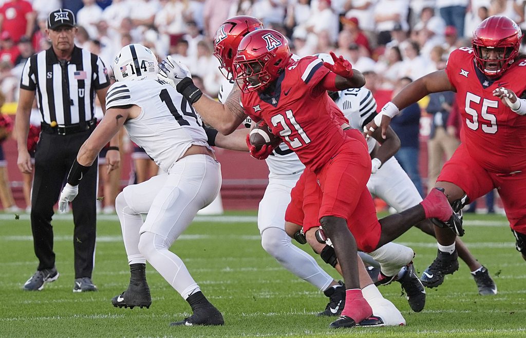Arizona Wildcats running back Ismail Mahdi (21)runs with the ball against Iowa state during the first quarter in the Big-12 conference showdown on Sept. 27, 2025, at Jack Trice Stadium in Ames, Iowa.