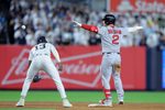 Sep 30, 2025; Bronx, New York, USA; Boston Red Sox third baseman Alex Bregman (2) celebrates his RBI double against the New York Yankees during the ninth inning of game one of the Wildcard round of the 2025 MLB playoffs at Yankee Stadium. Mandatory Credit: Brad Penner-Imagn Images