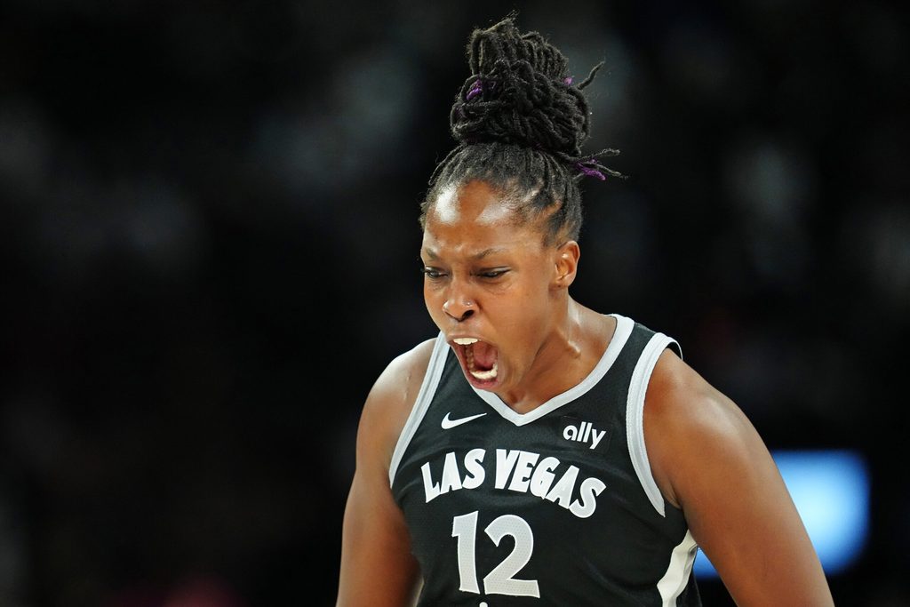 Sep 30, 2025; Las Vegas, Nevada, USA; Las Vegas Aces guard Chelsea Gray (12) celebrates after making a play against the Indiana Fever during the fourth quarter of game five of the second round for the 2025 WNBA Playoffs at Michelob Ultra Arena. Mandatory Credit: Stephen R. Sylvanie-Imagn Images