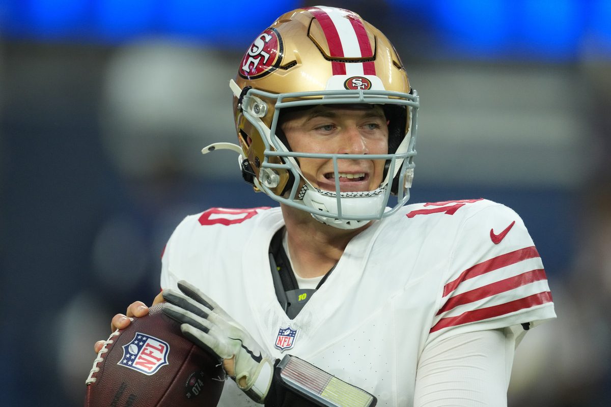 Oct 2, 2025; Inglewood, California, USA; San Francisco 49ers quarterback Mac Jones (10) drops back to pass against the Los Angeles Rams during the first half at SoFi Stadium. Mandatory Credit: Kirby Lee-Imagn Images