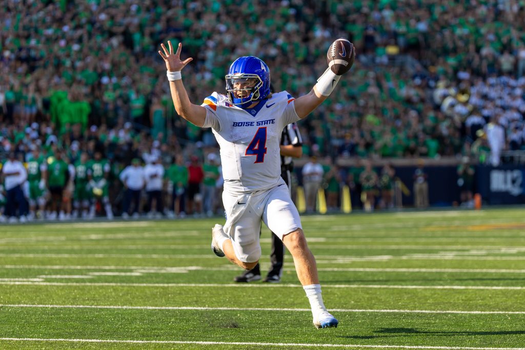 Oct 4, 2025; South Bend, Indiana, USA; Boise State Broncos quarterback Maddux Madsen (4) celebrates as he runs in a touchdown against the Notre Dame Fighting Irish during the first half at Notre Dame Stadium. Mandatory Credit: Michael Caterina-Imagn Images