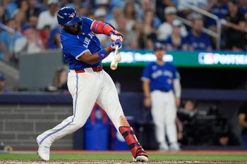 Oct 5, 2025; Toronto, Ontario, CAN; Toronto Blue Jays first baseman Vladimir Guerrero Jr. (27) bats in the eighth inning against the New York Yankees during game two of the ALDS round for the 2025 MLB playoffs at Rogers Centre. Mandatory Credit: John E. Sokolowski-Imagn Images