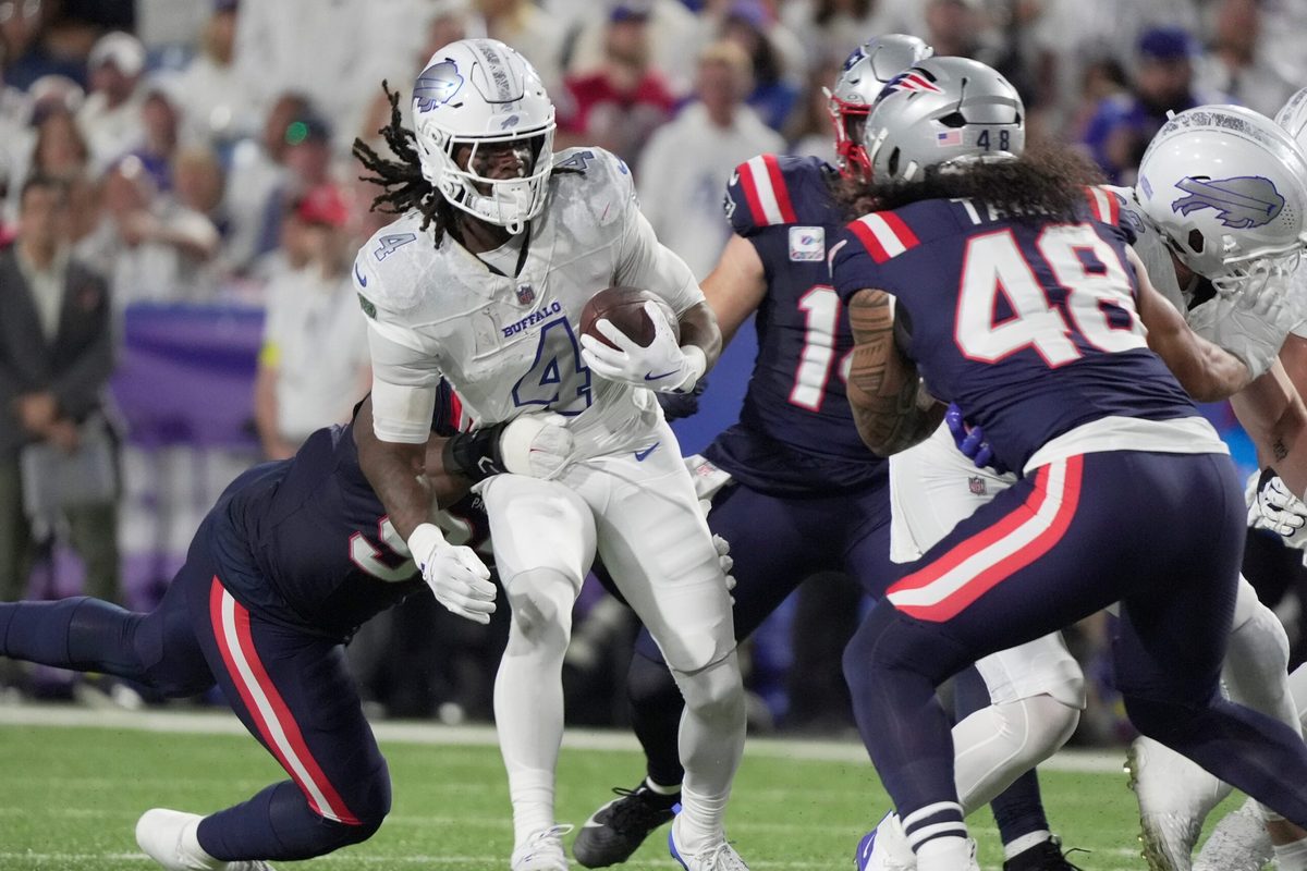 Buffalo Bills running back James Cook carries the ball during firsts half action at Highmark Stadium in Orchard Park on Oct. 5, 2025.