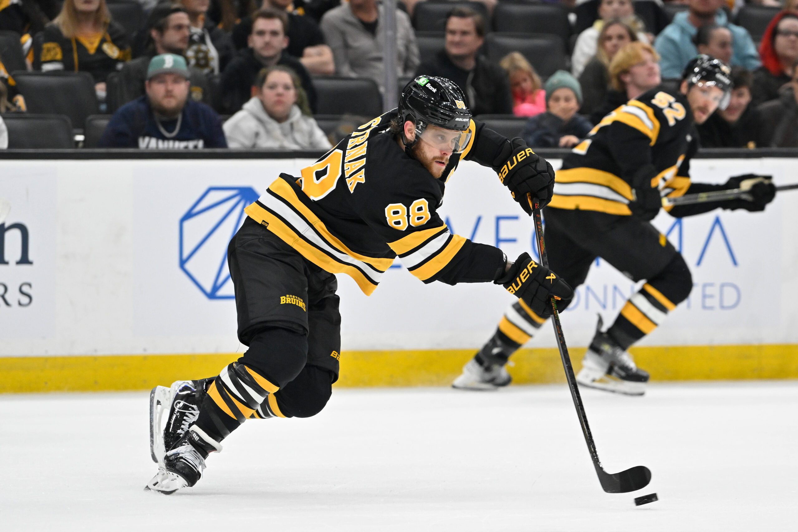 Sep 29, 2025; Boston, Massachusetts, USA; Boston Bruins right wing David Pastrnak (88) passes the puck during the second period against the Philadelphia Flyers at TD Garden. Mandatory Credit: Eric Canha-Imagn Images