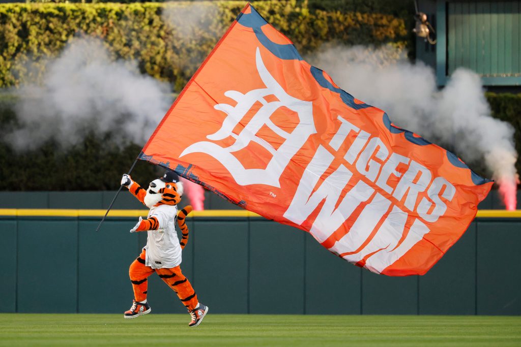 Oct 8, 2025; Detroit, Michigan, USA; PAWS the Detroit Tigers mascot celebrates the victory against the Seattle Mariners during game four of the ALDS round for the 2025 MLB playoffs at Comerica Park. Mandatory Credit: Rick Osentoski-Imagn Images