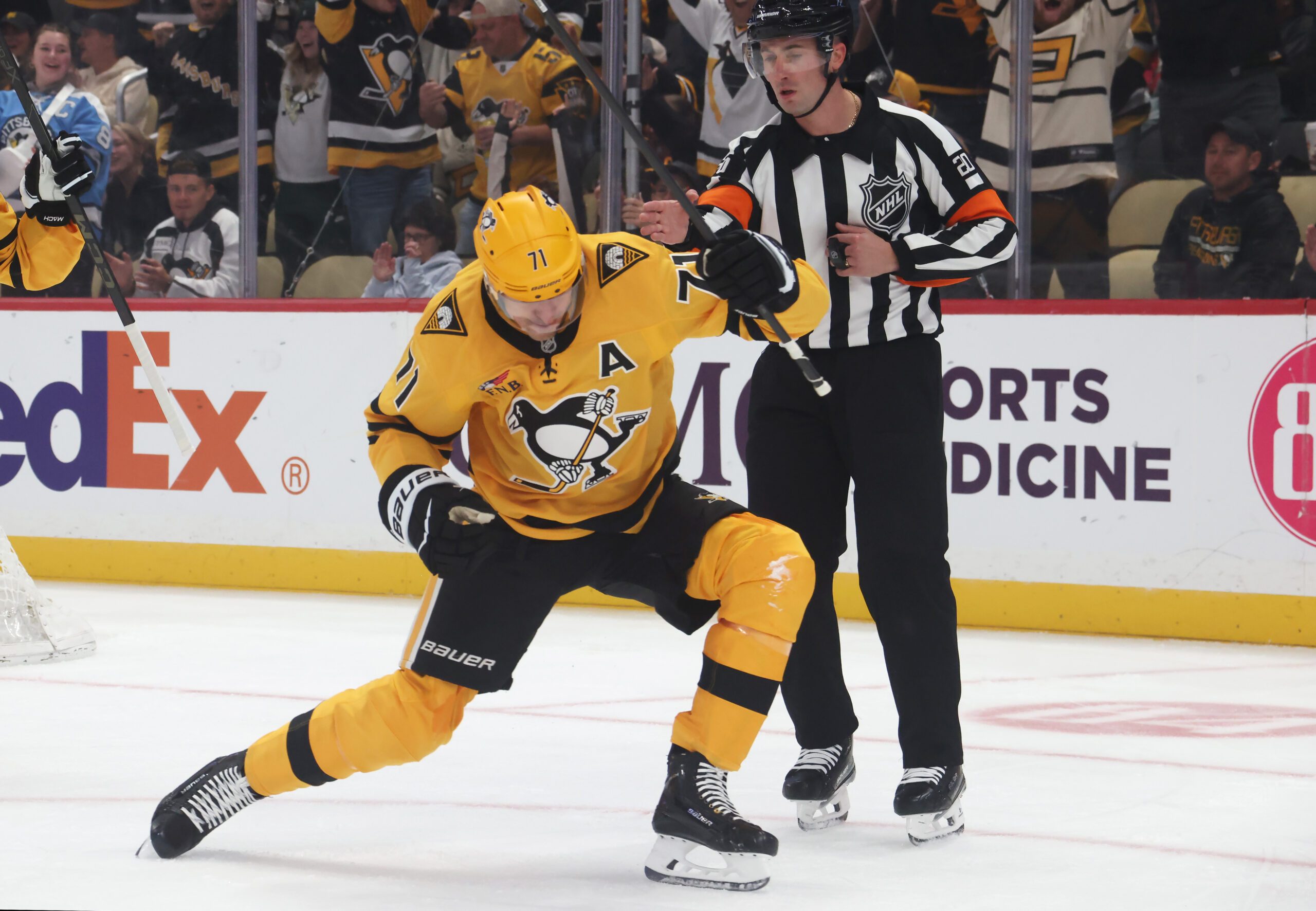 Oct 9, 2025; Pittsburgh, Pennsylvania, USA;  Pittsburgh Penguins center Evgeni Malkin (71) reacts after scoring a goal against the New York Islanders during the first period at PPG Paints Arena. Mandatory Credit: Charles LeClaire-Imagn Images