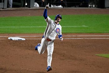 Oct 9, 2025; Chicago, Illinois, USA; Chicago Cubs right fielder Kyle Tucker (30) reacts after hitting a home run against the Milwaukee Brewers during the seventh inning in game four of the NLDS round for the 2025 MLB playoffs at Wrigley Field. Mandatory Credit: Matt Marton-Imagn Images