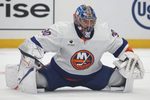 Oct 9, 2025; Pittsburgh, Pennsylvania, USA;  New York Islanders goaltender Ilya Sorokin (30) stretches on the ice during a stoppage in play against athe Pittsburgh Penguins in the first period t PPG Paints Arena. Mandatory Credit: Charles LeClaire-Imagn Images