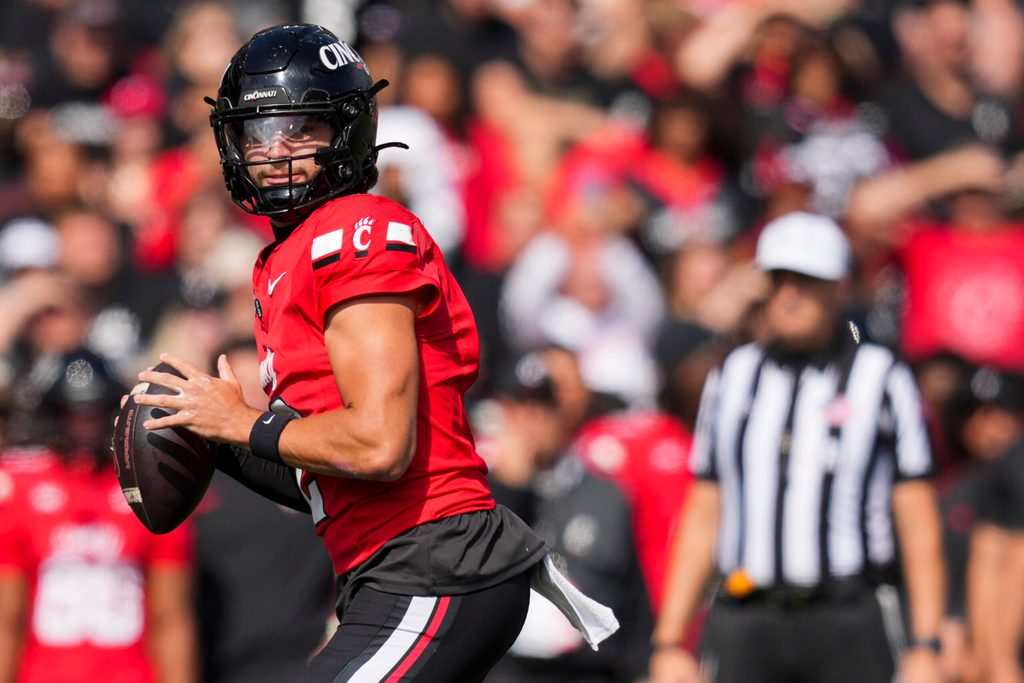 Oct 11, 2025; Cincinnati, Ohio, USA; Cincinnati Bearcats quarterback Brendan Sorsby (2) looks to pass against the UCF Knights in the first half at Nippert Stadium. Mandatory Credit: Aaron Doster-Imagn Images
