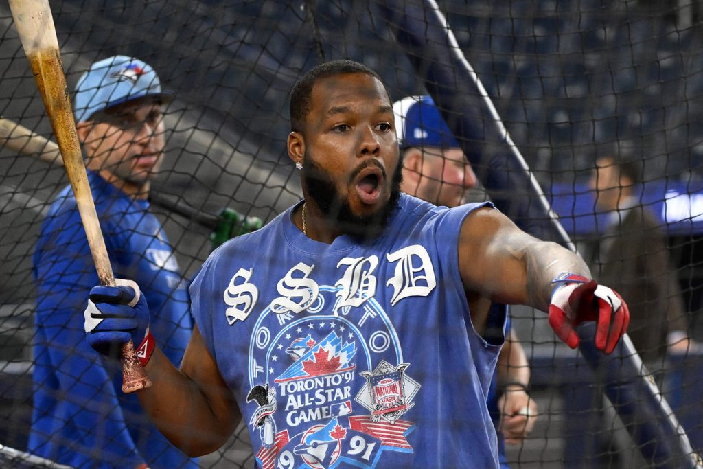 Oct 11, 2025; Toronto, Ontario, CA; Toronto Blue Jays first baseman Vladimir Guerrero Jr. (27) reacts in batting practice during workouts for the American League Championship Series at Rogers Centre. Mandatory Credit: Dan Hamilton-Imagn Images