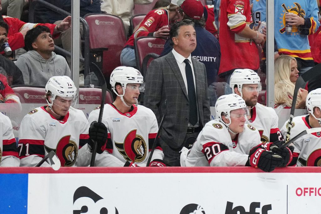 Oct 11, 2025; Sunrise, Florida, USA; Ottawa Senators head coach Travis green looks on during the second period against the Florida Panthers at Amerant Bank Arena. Mandatory Credit: Jim Rassol-Imagn Images