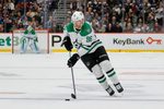 Oct 11, 2025; Denver, Colorado, USA; Dallas Stars right wing Mikko Rantanen (96) skates the puck up in a shootout against the Colorado Avalanche at Ball Arena. Mandatory Credit: Isaiah J. Downing-Imagn Images