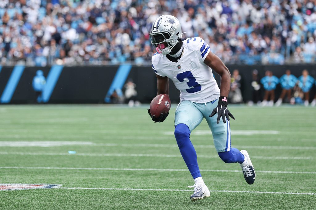 Oct 12, 2025; Charlotte, North Carolina, USA; Dallas Cowboys wide receiver George Pickens (3) runs with the ball during the first quarter against the Carolina Panthers at Bank of America Stadium. Mandatory Credit: Cory Knowlton-Imagn Images