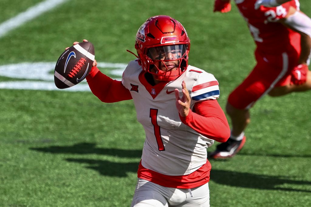 Oct 18, 2025; Houston, Texas, USA; Arizona Wildcats quarterback Noah Fifita (1) throws the ball during the first quarter against the Houston Cougars at TDECU Stadium. Mandatory Credit: Maria Lysaker-Imagn Images