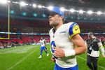 Oct 19, 2025; London, United Kingdom; Los Angeles Rams quarterback Matthew Stafford (9) runs off the field after their win against the Jacksonville Jaguars in an NFL International Series game at Wembley Stadium. Mandatory Credit: Kirby Lee-Imagn Images