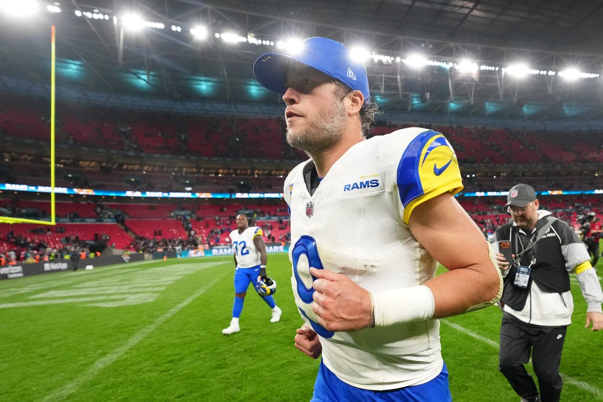 Oct 19, 2025; London, United Kingdom; Los Angeles Rams quarterback Matthew Stafford (9) runs off the field after their win against the Jacksonville Jaguars in an NFL International Series game at Wembley Stadium. Mandatory Credit: Kirby Lee-Imagn Images