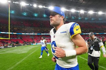Oct 19, 2025; London, United Kingdom; Los Angeles Rams quarterback Matthew Stafford (9) runs off the field after their win against the Jacksonville Jaguars in an NFL International Series game at Wembley Stadium. Mandatory Credit: Kirby Lee-Imagn Images