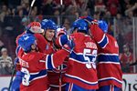 Oct 20, 2025; Montreal, Quebec, CAN; Montreal Canadiens forward Juraj Slafkovsky (20) celebrates with teammates after scoring a goal against the Buffalo Sabres during the third period at the Bell Centre. Mandatory Credit: Eric Bolte-Imagn Images