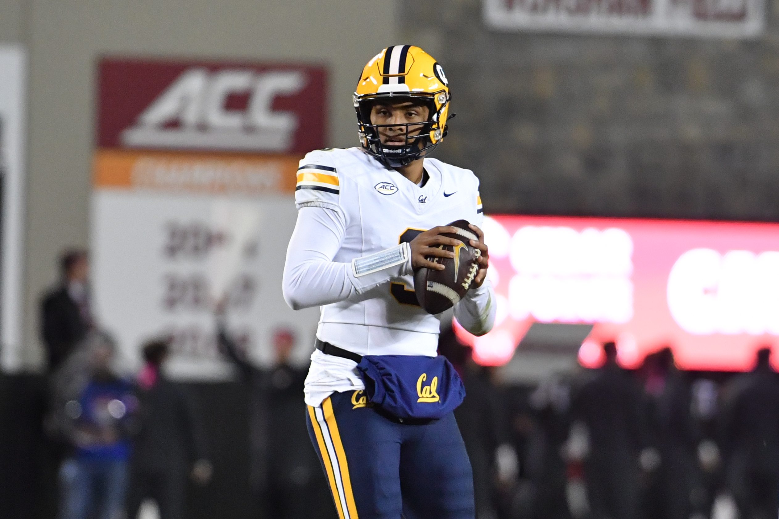 Oct 24, 2025; Blacksburg, Virginia, USA;  California Golden Bears quarterback Jaron-Keawe Sagapolutele (3) looks to throw a pass against the Virginia Tech Hokies during the second quarter at Lane Stadium. Mandatory Credit: Brian Bishop-Imagn Images