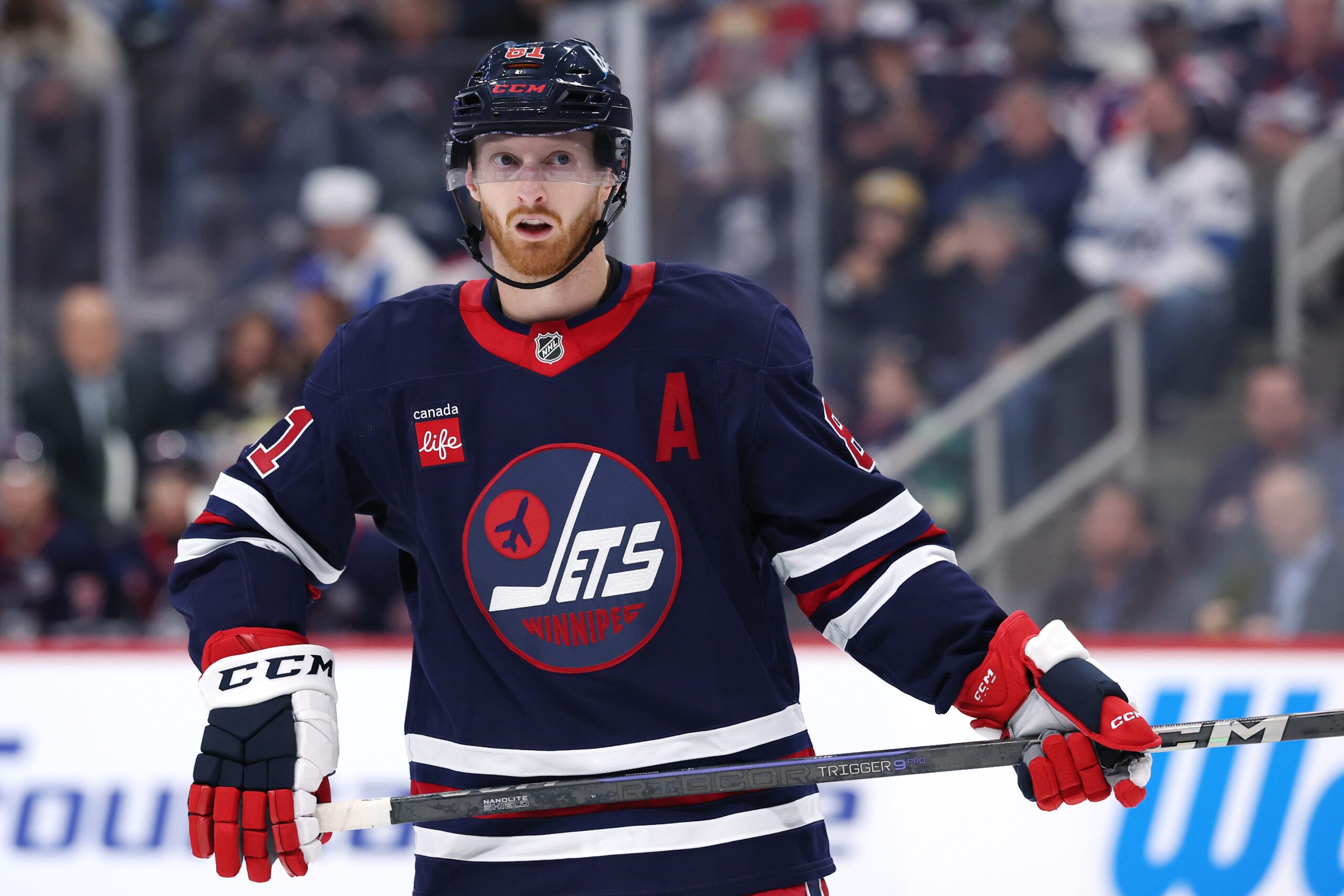 Oct 24, 2025; Winnipeg, Manitoba, CAN; Winnipeg Jets left wing Kyle Connor (81) looks on prior to a face off against the Calgary Flames in the second period at Canada Life Centre. Mandatory Credit: James Carey Lauder-Imagn Images