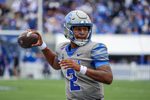 Oct 25, 2025; Memphis, Tennessee, USA; Memphis Tigers quarterback Brendon Lewis (2)looks to throw a pass against the South Florida Bulls during the second half at Simmons Bank Liberty Stadium. Mandatory Credit: Wesley Hale-Imagn Images