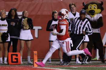 Oct 25, 2025; Salt Lake City, Utah, USA; Utah Utes running back Wayshawn Parker (1) runs the ball for a touchdown against the Colorado Buffaloes during the first quarter at Rice-Eccles Stadium. Mandatory Credit: Rob Gray-Imagn Images