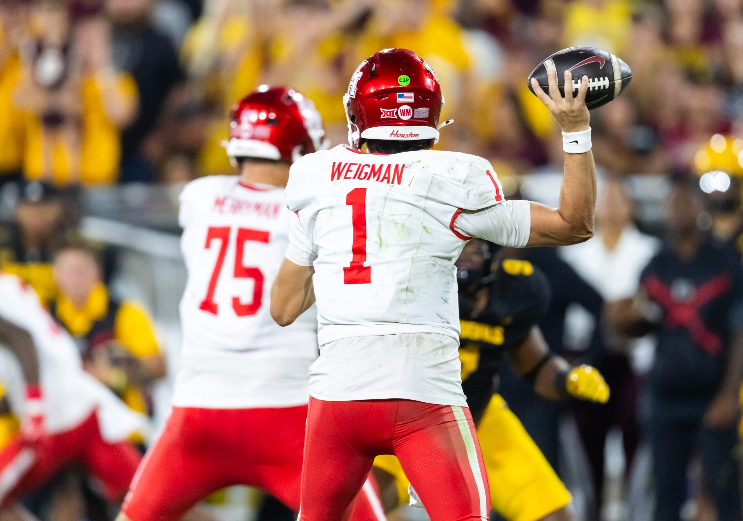 Oct 25, 2025; Tempe, Arizona, USA; Detailed view of the jersey of Houston Cougars quarterback Conner Weigman (1) against the Arizona State Sun Devils at Mountain America Stadium. Mandatory Credit: Mark J. Rebilas-Imagn Images