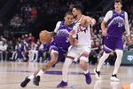 Oct 27, 2025; Salt Lake City, Utah, USA; Utah Jazz guard Keyonte George (3) drives against Phoenix Suns guard Devin Booker (1) during overtime at Delta Center. Mandatory Credit: Rob Gray-Imagn Images